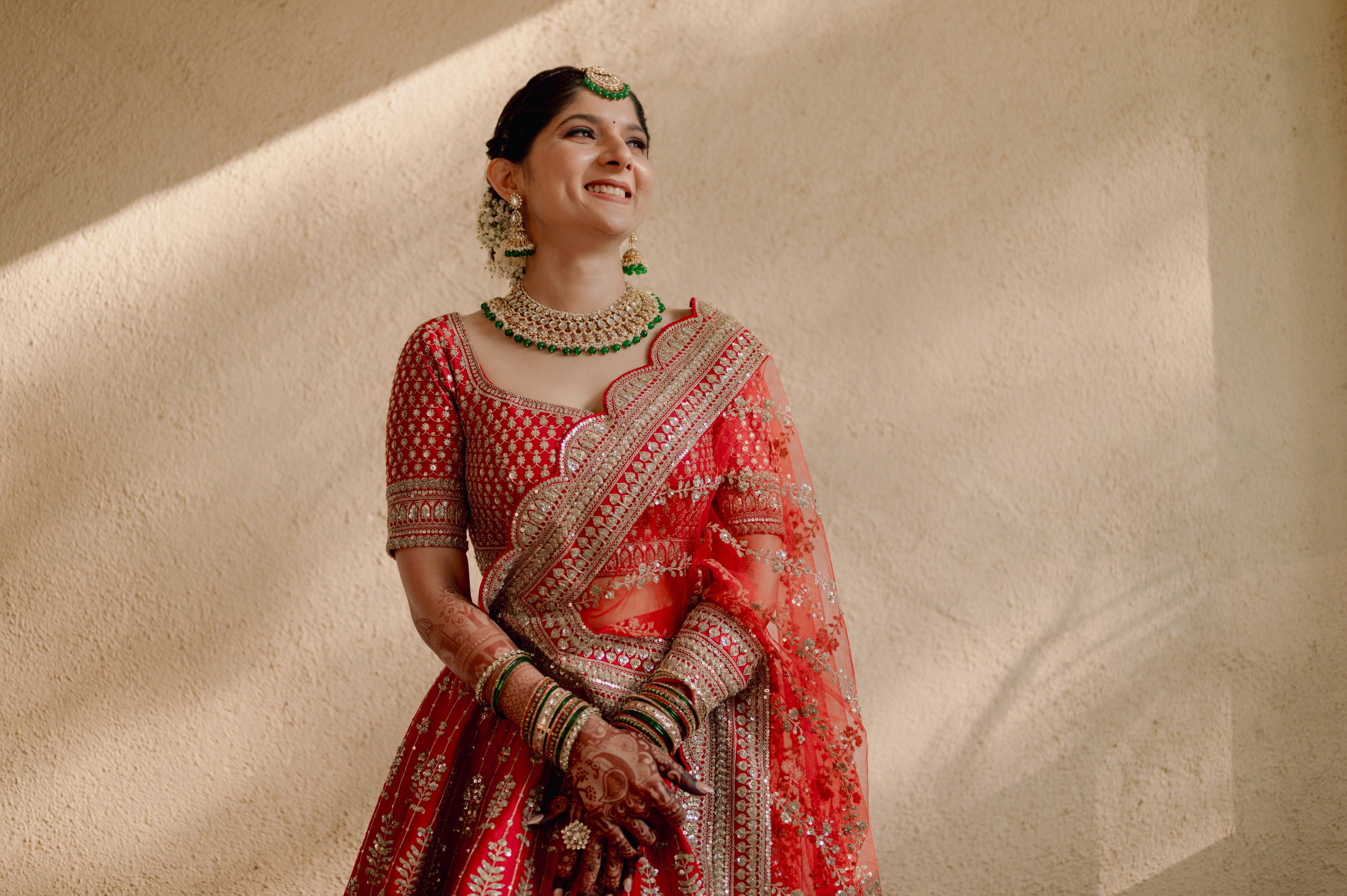 Red bridal lehenga — natural sunlight