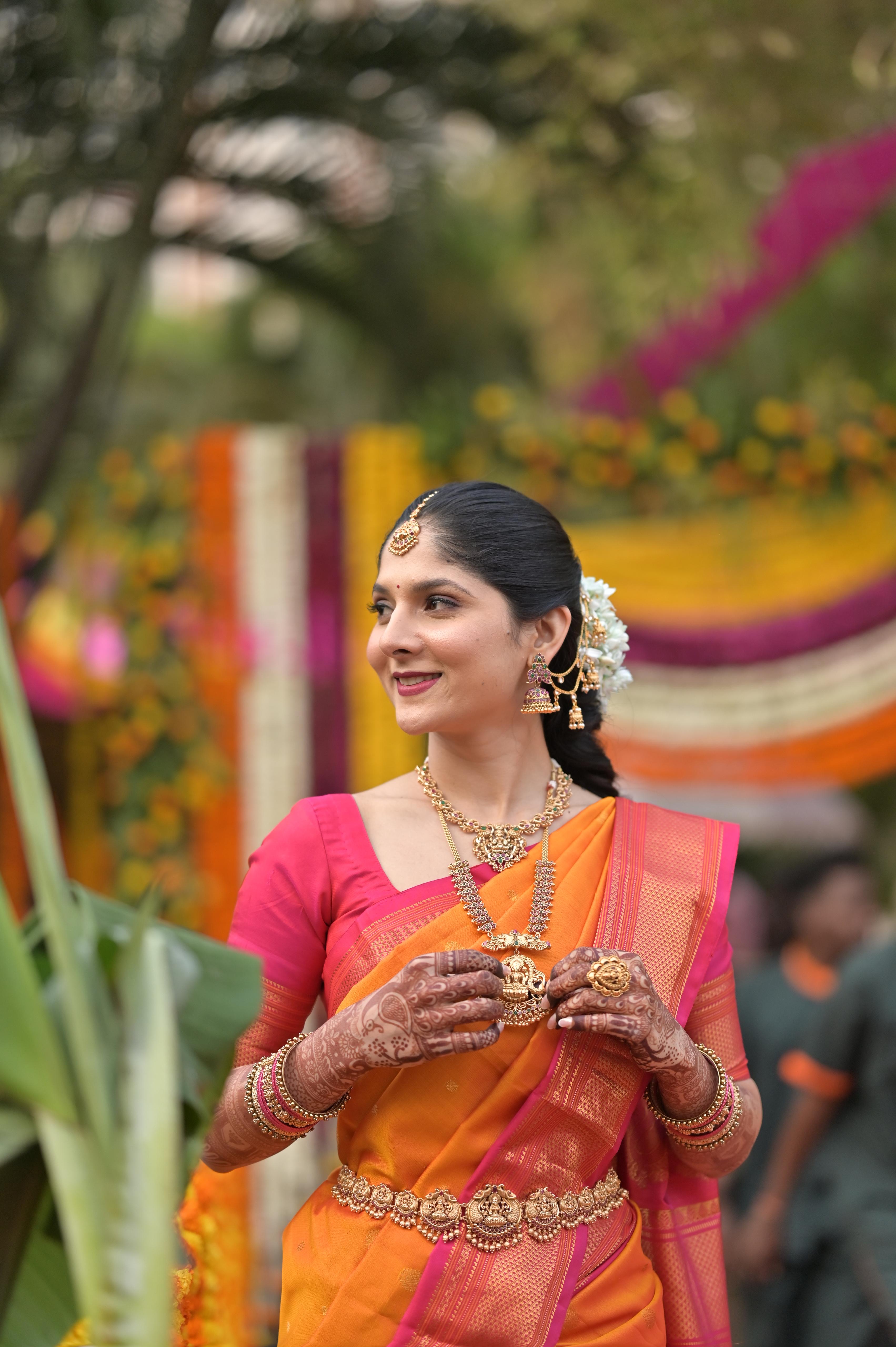 Orange Kanchipuram saree — side profile